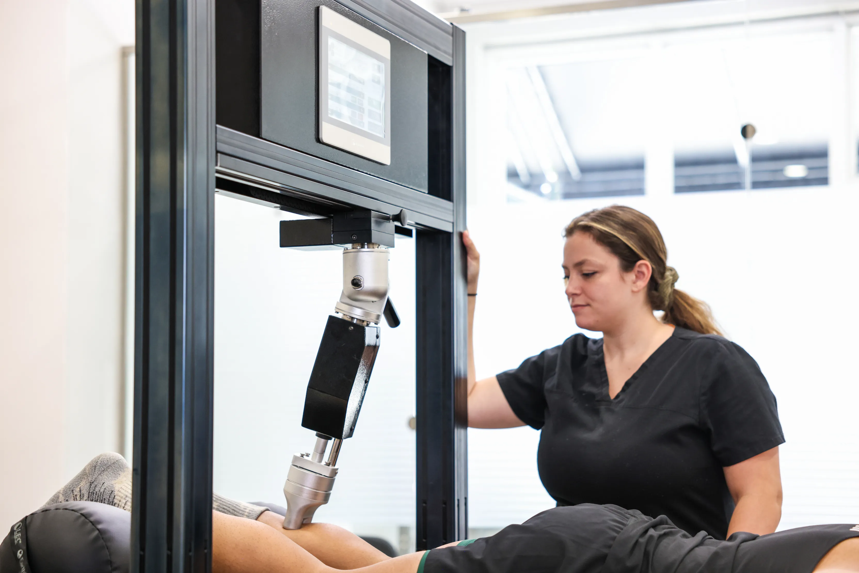 Sports medicine therapy session at TheraMax Miami